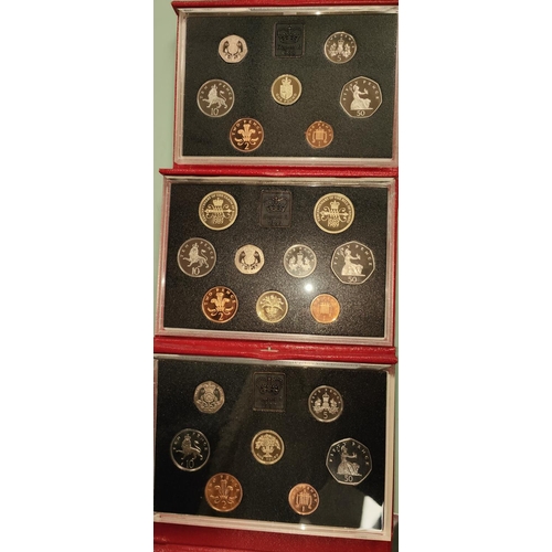 287A - Three red cased coin sets, 1987, 1988 and 1989