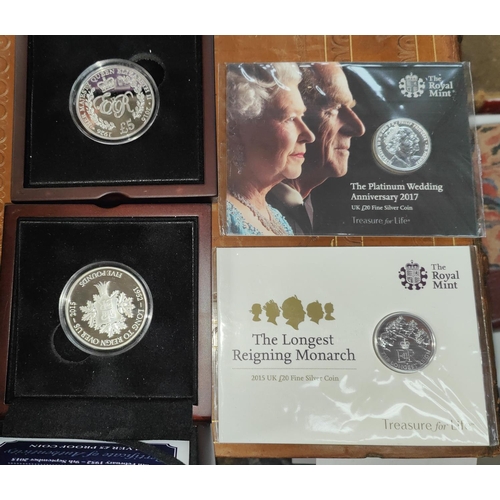 319 - GB: QEII: Two commemorative £20 silver coins, two silver proof crowns