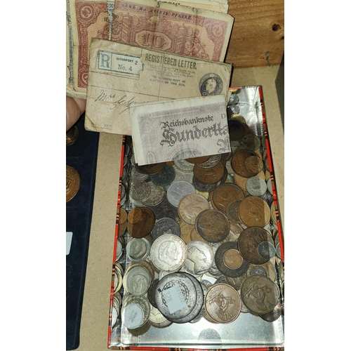 328 - A mixed collection of coins and banknotes