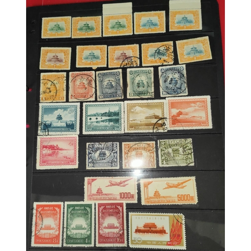 367 - CHINA: A collection of modern and vintage stamps on 10 stock book leaves