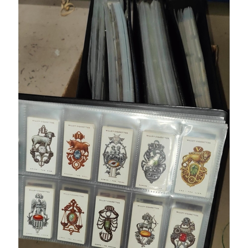 368 - 4 albums of cigarette cards and trade cards, a large selection of sorted loose cards