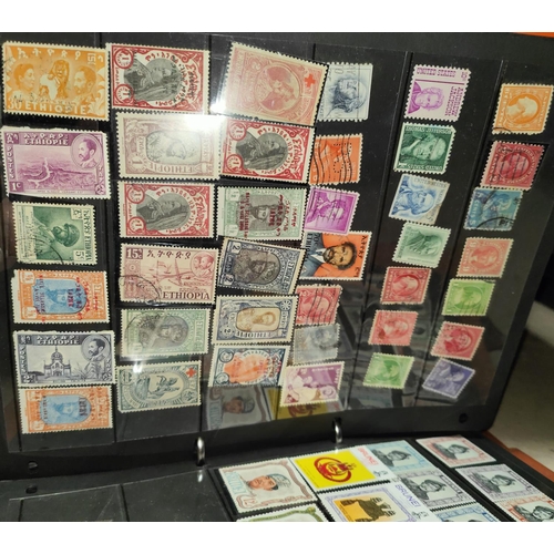 371 - A collection of world stamps in albums and stock books