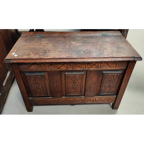 947 - A 1920's period style panelled oak blanket chest, 90cm