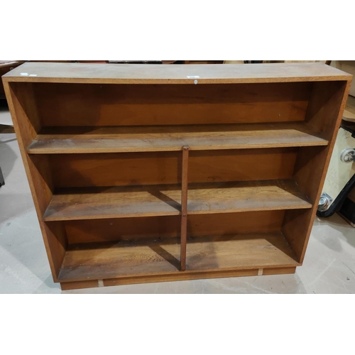 949 - A 1950's arts and crafts 3 height oak bookcase, 107cm wide x 89cm high