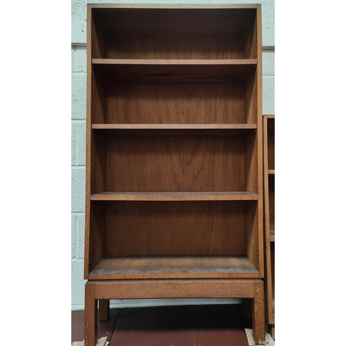 951 - A 1950's arts and crafts oak bookcase, 69cm wide x 130cm high