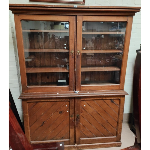 956 - A Victorian pitched pine cupboard with glazed upper section, 160 x 50 x 215 cm high