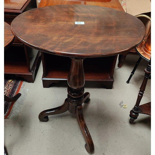 977 - A 19th century mahogany occ. table with oval top on pedestal base with 3 splay feet; an Edwardian oc... 