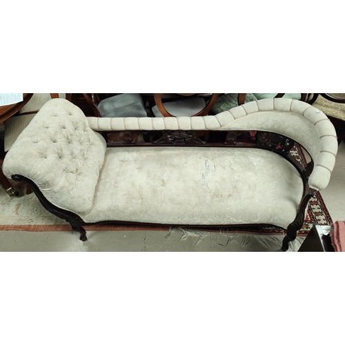 998 - A Victorian mahogany framed chaise longue with button back etc.