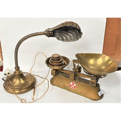 44 - A set of brass kitchen scales and weights; a brass reading lamp