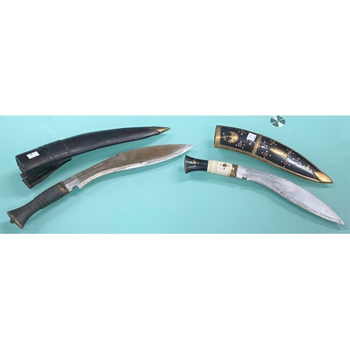 72A - 2 mid 20th century Kukris, one in inlaid scabbard, one in leather