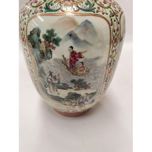 466 - A Chinese famille rose vase with four detailed panels of deities, green glaze, 6 character mark... 