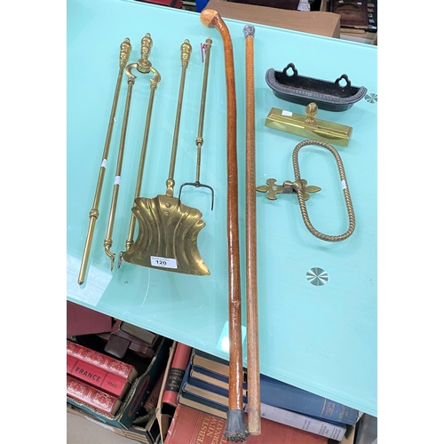 120 - A set of 3 brass fire irons; a stick stand and sticks