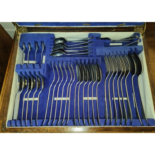 659 - A part canteen of cutlery in oak case; loose and boxed cutlery; souvenir teaspoons; etc.