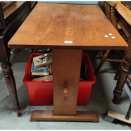 957 - A 1950's arts and crafts oak and ash dining table with trestle supports united by stretcher, 121 x 5... 