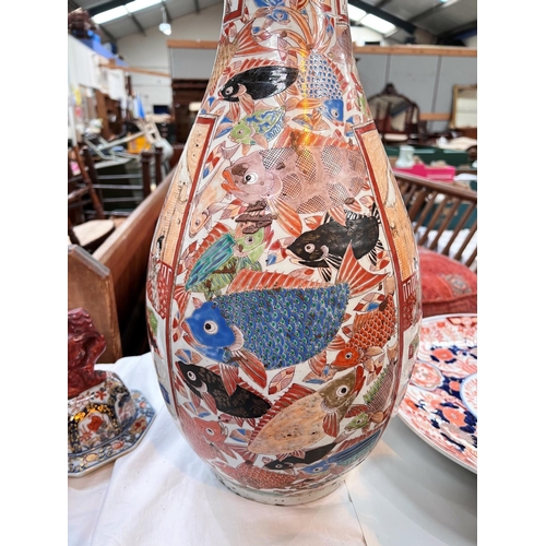 442 - A large Japanese Kutani highly decorative vase with fish panels of traditional scenes with wide ribb... 