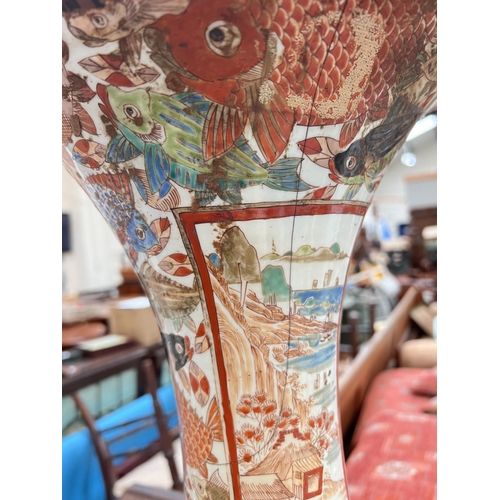 442 - A large Japanese Kutani highly decorative vase with fish panels of traditional scenes with wide ribb... 