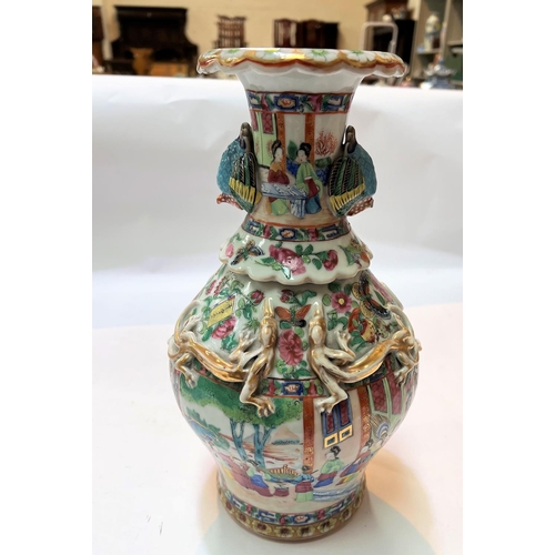 451 - A Chinese famille rose baluster vase with bird handles (birds' beaks chipped)