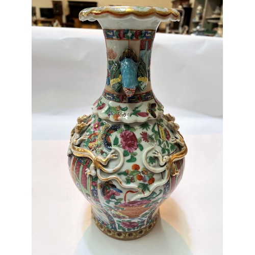 451 - A Chinese famille rose baluster vase with bird handles (birds' beaks chipped)