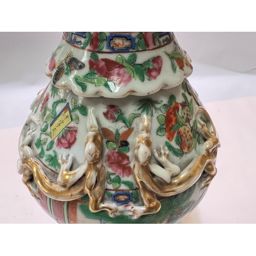 451 - A Chinese famille rose baluster vase with bird handles (birds' beaks chipped)