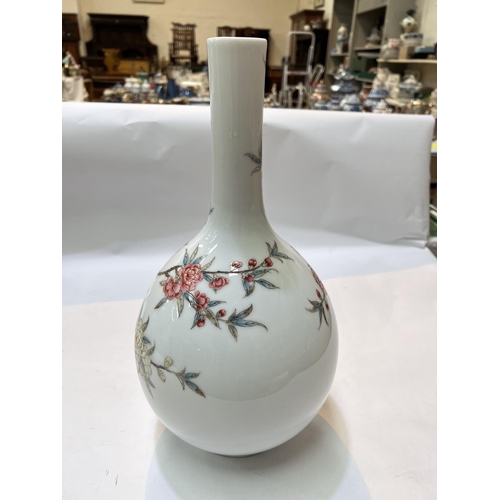 453 - A Chinese bulbous vase with slender neck, decorated with polychrome flowering branches, poss. Republ... 