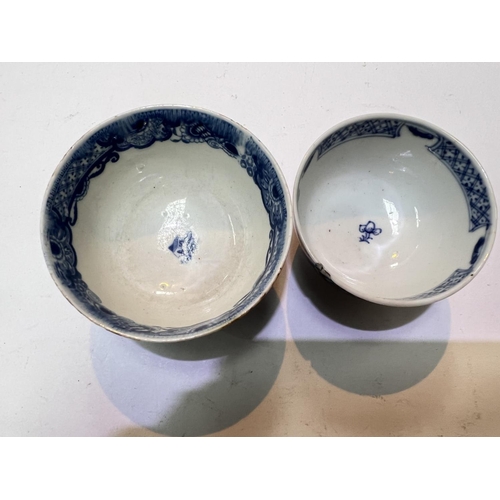 455 - Two Chinese blue and white tea bowls, one decorated with bats and moths etc.