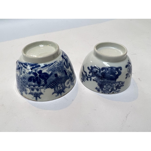 455 - Two Chinese blue and white tea bowls, one decorated with bats and moths etc.