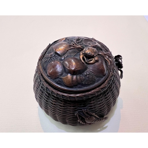 476 - A Japanese late 19th/early 20th century copper ink well in the form of fisherman's woven basket with... 