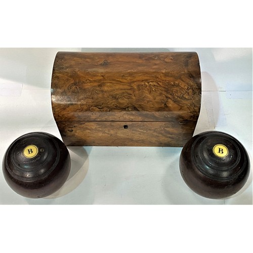 102 - A walnut domed 2 section tea caddy and 2 bowls