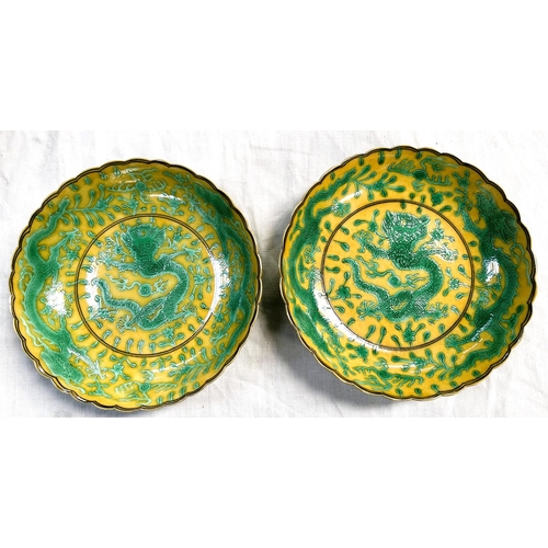 461A - A pair of Chinese yellow ground, scallop edged dishes with detailed green dragon decoration, seal ma... 