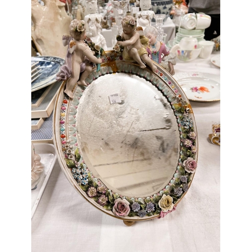 536 - A 19th century Dresden mirror with 2 cherubs above, with floral encrusted decoration, height 33cm (s... 