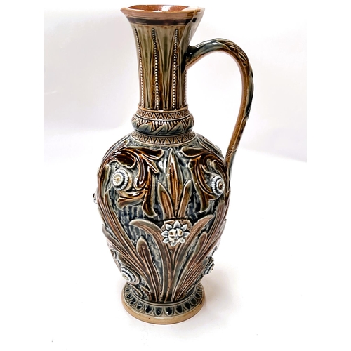 540c - A Doulton Lambeth ewer with relief decoration, signed to base (rim a.f.