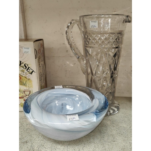 615A - A Kosta Boda heavy studio glass bowl with pale blue and white swirls within clear body, w.17cm; a ta... 