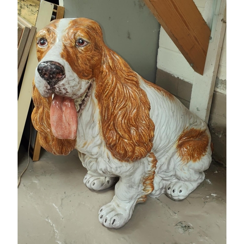 618 - A large mid 20th century Italian pot dog model of a Spaniel with white and light brown patches, heig... 