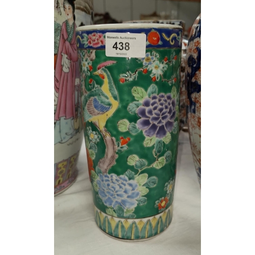 438 - A Japanese ceramic sleeve vase decorated with chrysanthemums, birds etc.