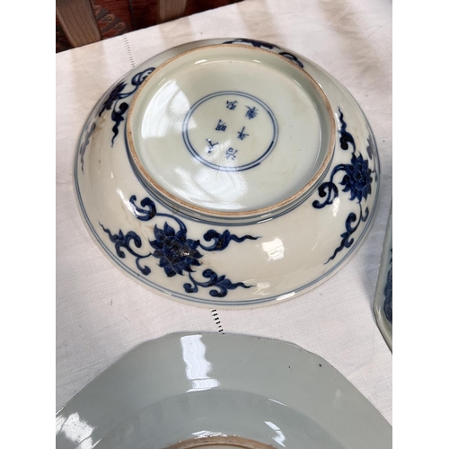 458 - Four Chinese blue & white dishes, various ages with different decoration, one octagonal, the oth... 