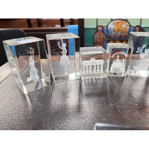 548A - A good selection of squared glass paperweights, various landmarks etc