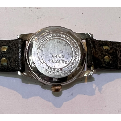 679B - A mid 20th century gent's wristwatch by Le Phare, with moon phase, day and month complications with ... 