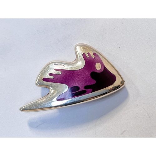 683a - Georg Jensen:&nbsp; a modernist silver brooch in the form of a stylized fish with body in shades of ...