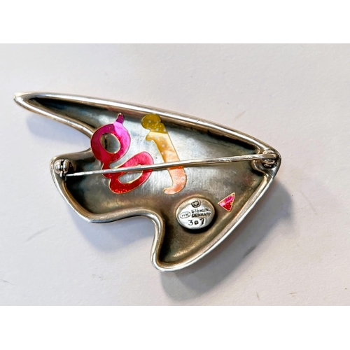 683a - Georg Jensen:  a modernist silver brooch in the form of a stylized fish with body in shades of ... 