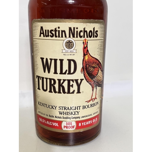 400I - A litre bottle of Austin Nichols WILD TURKEY Kentucky Styraight Bourbon whisky 50.5%vol, level low n... 