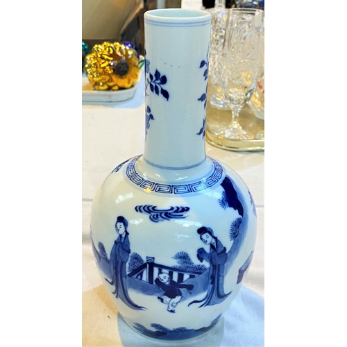 469 - A Chinese blue and white vase with bulbous body and slender neck with traditional scene decoration a... 