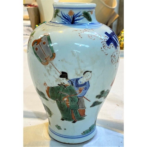 474 - A Chinese vase decorated with traditional scenes, height 18cm