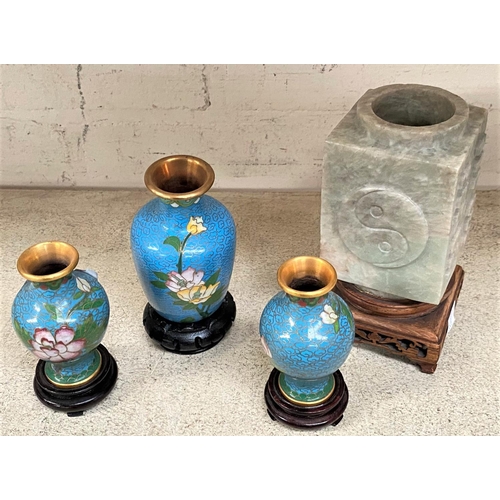 478 - A Chinese soapstone square vase on hardwood stand; 3 miniature cloisonné vases on stands