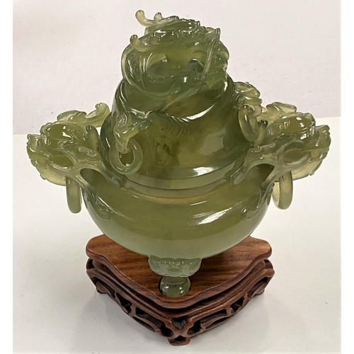 483 - A Chinese 'spinach green' jade covered vase with facemask lid and grotesque head and ring handles, o... 