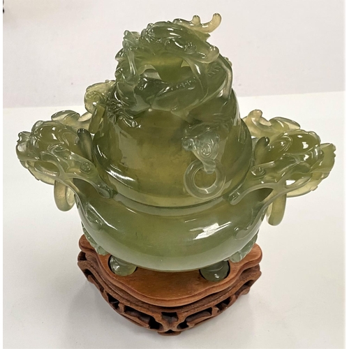 483 - A Chinese 'spinach green' jade covered vase with facemask lid and grotesque head and ring handles, o... 