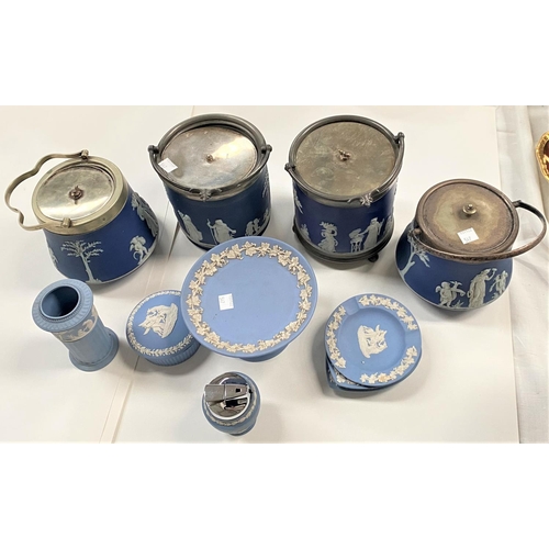 547 - Four Wedgwood/other blue jasperware biscuit barrels; other Jasperware