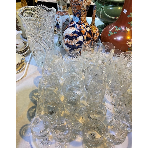 557 - A set of 7 leaded cut glass Champagne glasses, 6 Brandy glasses, other leaded cut glass etc; a glass... 