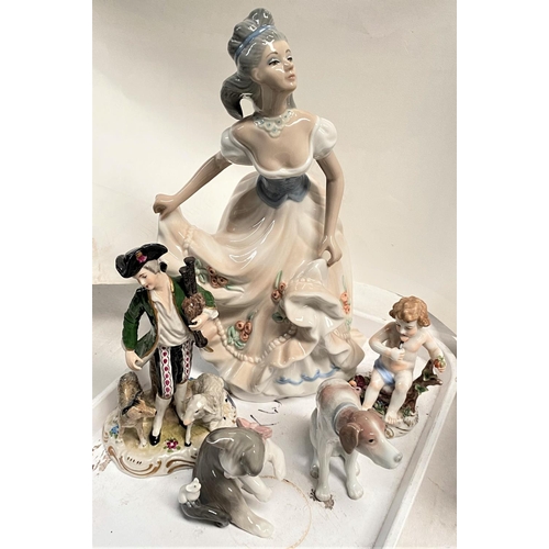 558a - A late Meissen figure: man in 18th century dress with bagpipes and sheep, crossed swords mark; a sel... 