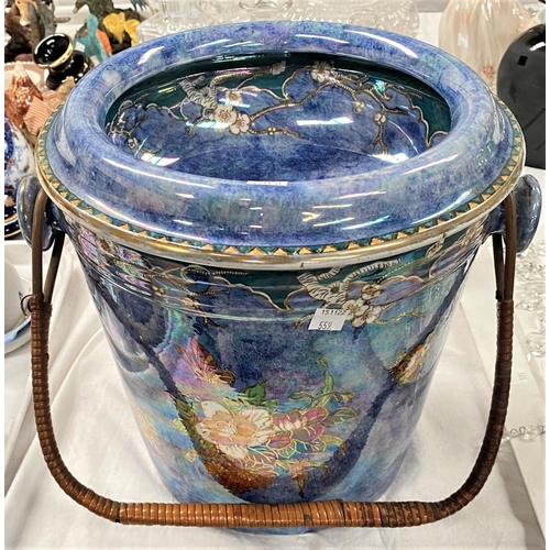 559 - An early 20th century 'Byzanta ware' by Grimwades Primrose purple lustre slop bucket with woven wood... 