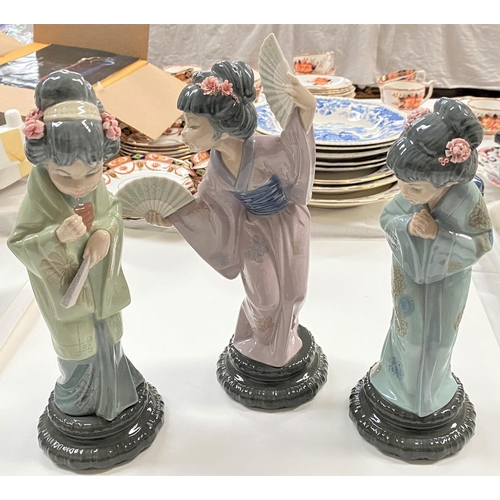 599 - Three Lladro figures of geisha girls